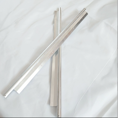 Scraper for dough roller